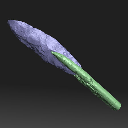 3D model of a artifact. It part is a sharp edge which is colored blue. The handle is colored green.