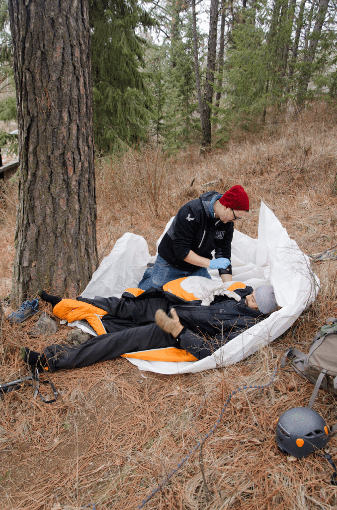 Practicing CPR on a training dummy