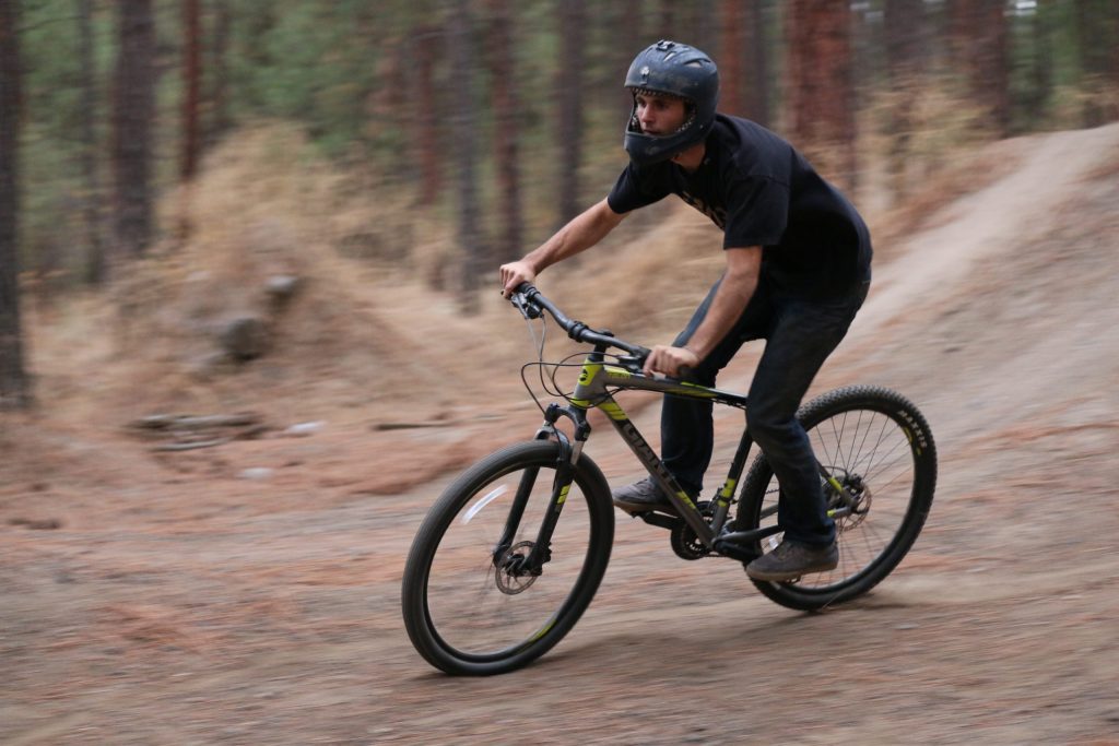 Person biking on a trail