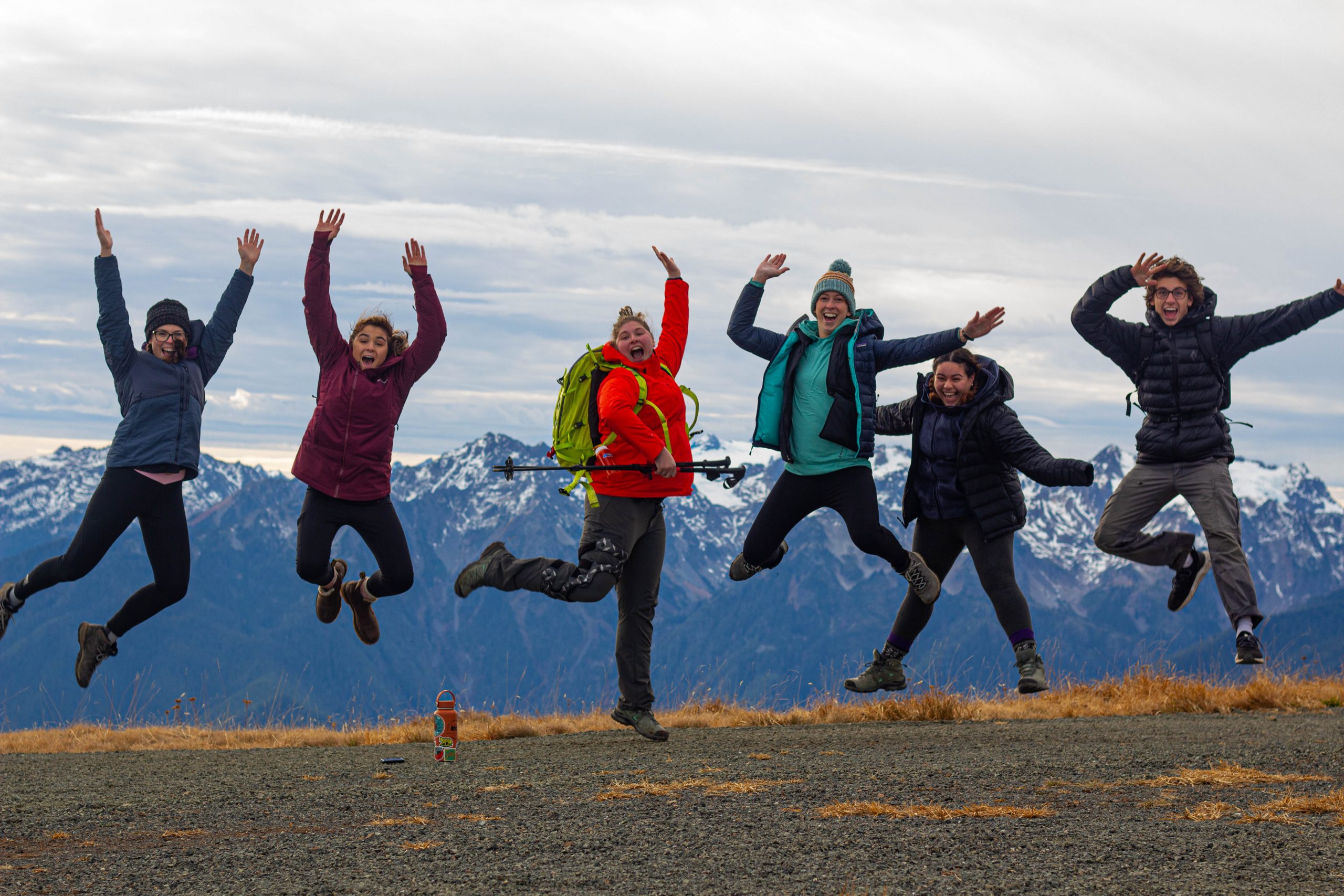 People jumping on a hiking