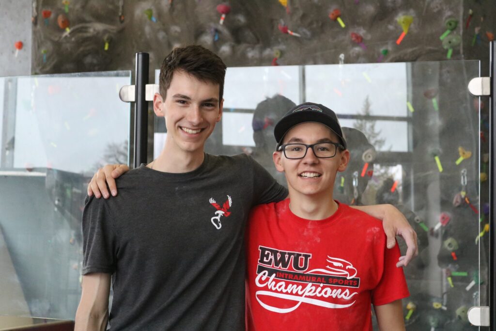 Two rockwall climbers posing for a photo