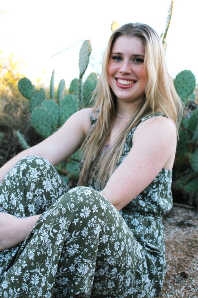 Makayla Thomason - Field Staff, posing for a photo