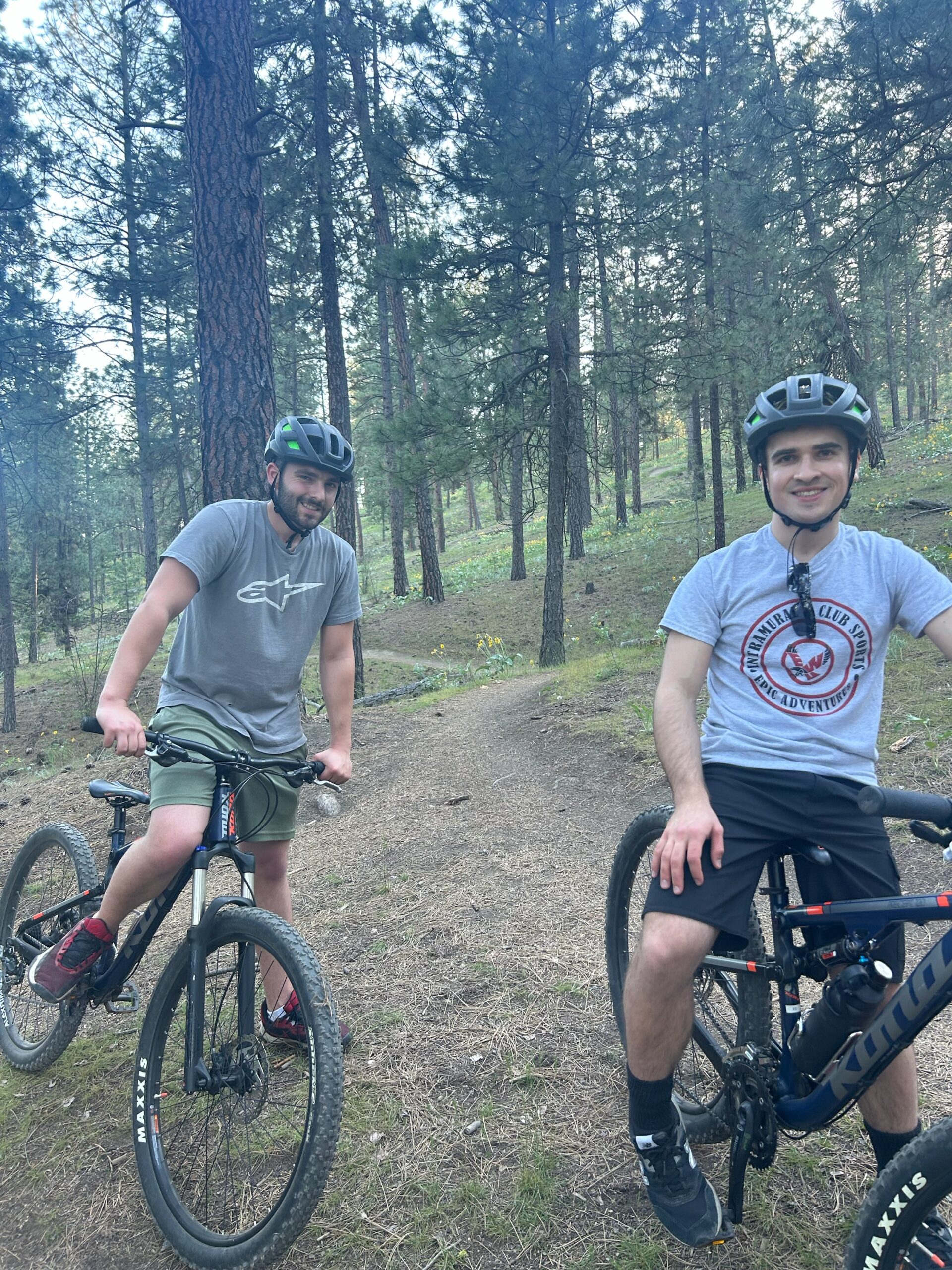 Two bikers on a bike trail