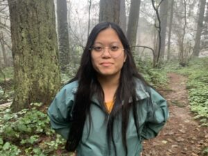 photo of Johanne McClenahan with forest background