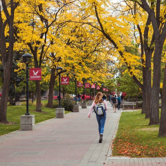 Student walking on ewu campus