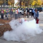 Putting out fires at EWU Fire Extinguisher Training