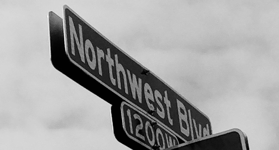 black and white photo of a Northwest Boulevard sign