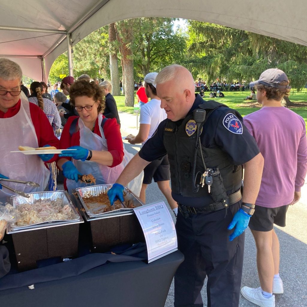 Deputy Chief O'Laughlin serving food