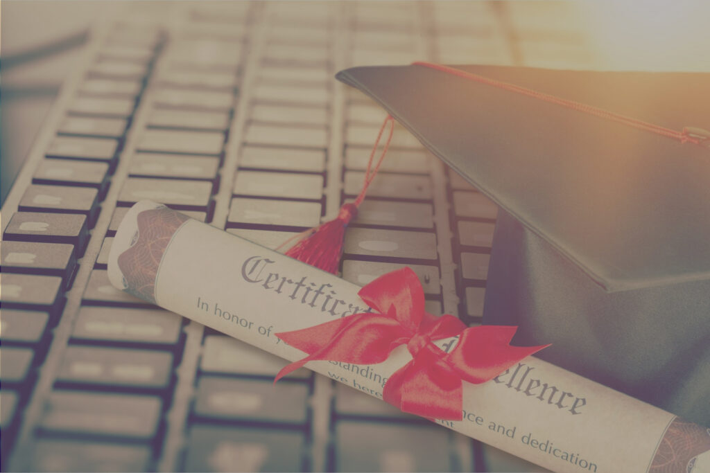 EWU Grad cap with a certificate